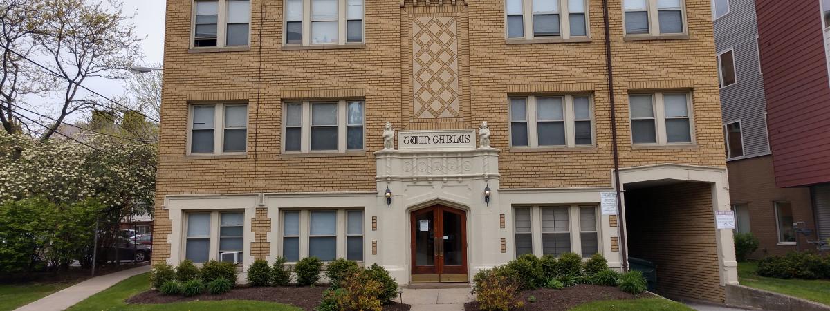 Twin gables building exterior showing front door
