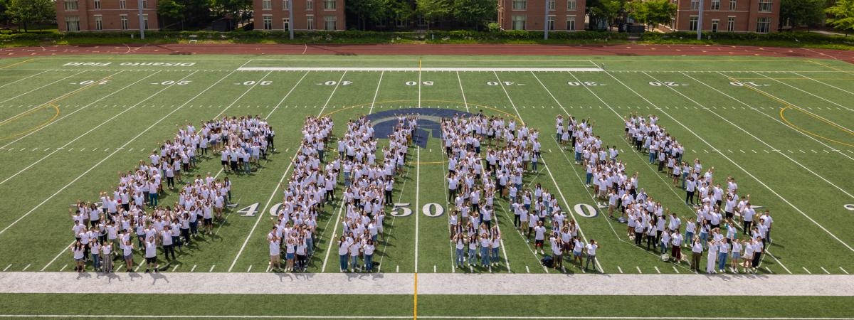 students for the letters "CWRU" on DiSanto field
