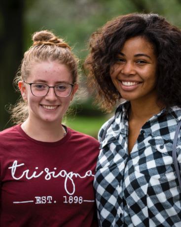 Two CWRU students smiling at the camera