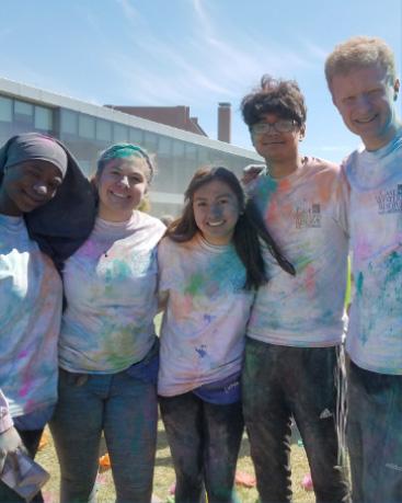 Students participating in the Holi celebration