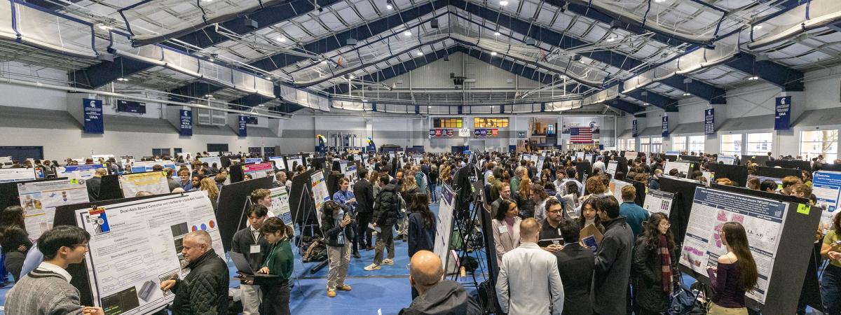 Photograph of poster symposium in Veale, December 2025