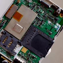 A close-up of a cell phone processor and chip.