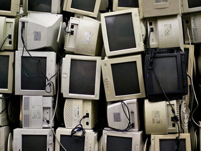 image of stacked old computer monitors