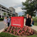 Sprint Team in front of National Cancer Institute Sign in DC