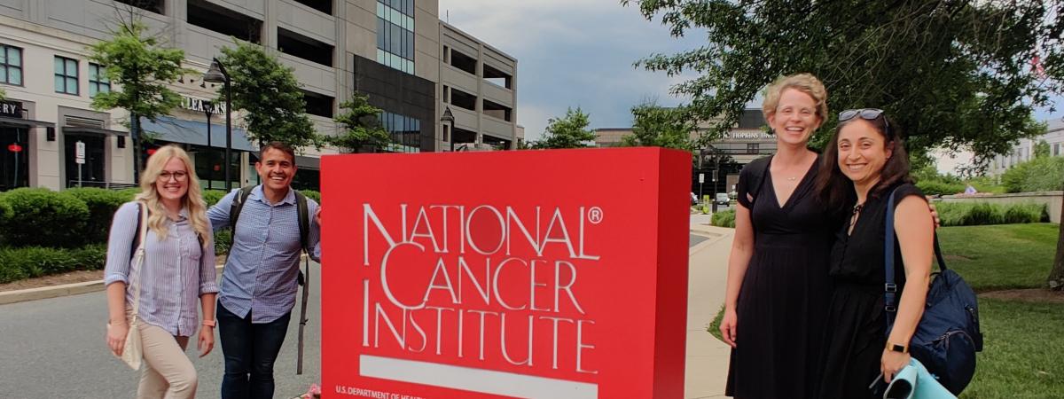 Sprint Team in front of National Cancer Institute Sign in DC