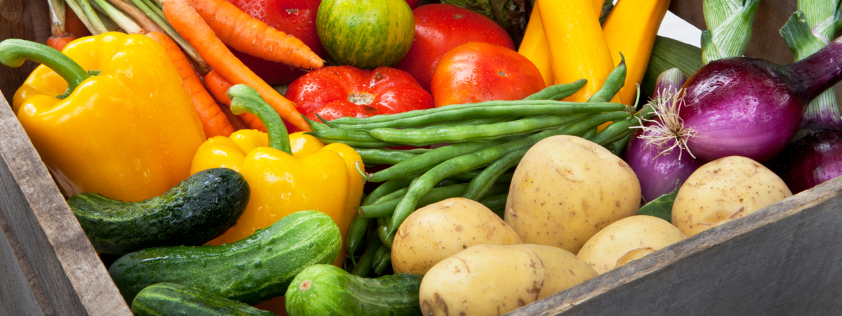 photo of fruits and vegetables in a wooden box