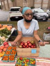 Headshot of Ms Toni at a farmers market