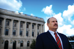 A photo of CWRU law professor Max Mehlman standing in front of a legal building.