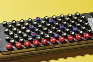 Rack of tubes used by Susann Brady-Kalnay to purify an imaging solution in order to better detect cancer.