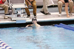 Case Western Reserve University student Drew Hamilton in the pool during a swimming competition