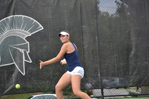Case Western Reserve student Madeleine Paolucci playing in a tennis competition
