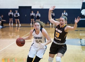 Kara Hageman and Hillary Hellmann playing basketball