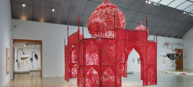 Art by Rina Banerjee that is a 18-foot-high pink plastic representation of the Taj Mahal.