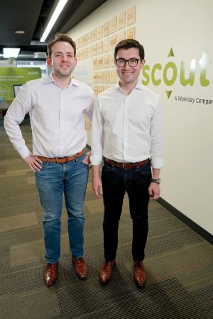 Stan Garber and Alex Yakubovich standing side by side in their office