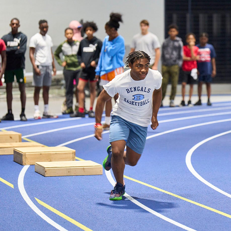 Summer campers on a running track at Case Western Reserve