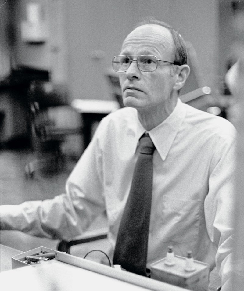 Black and white portrait photo of Tom Eck