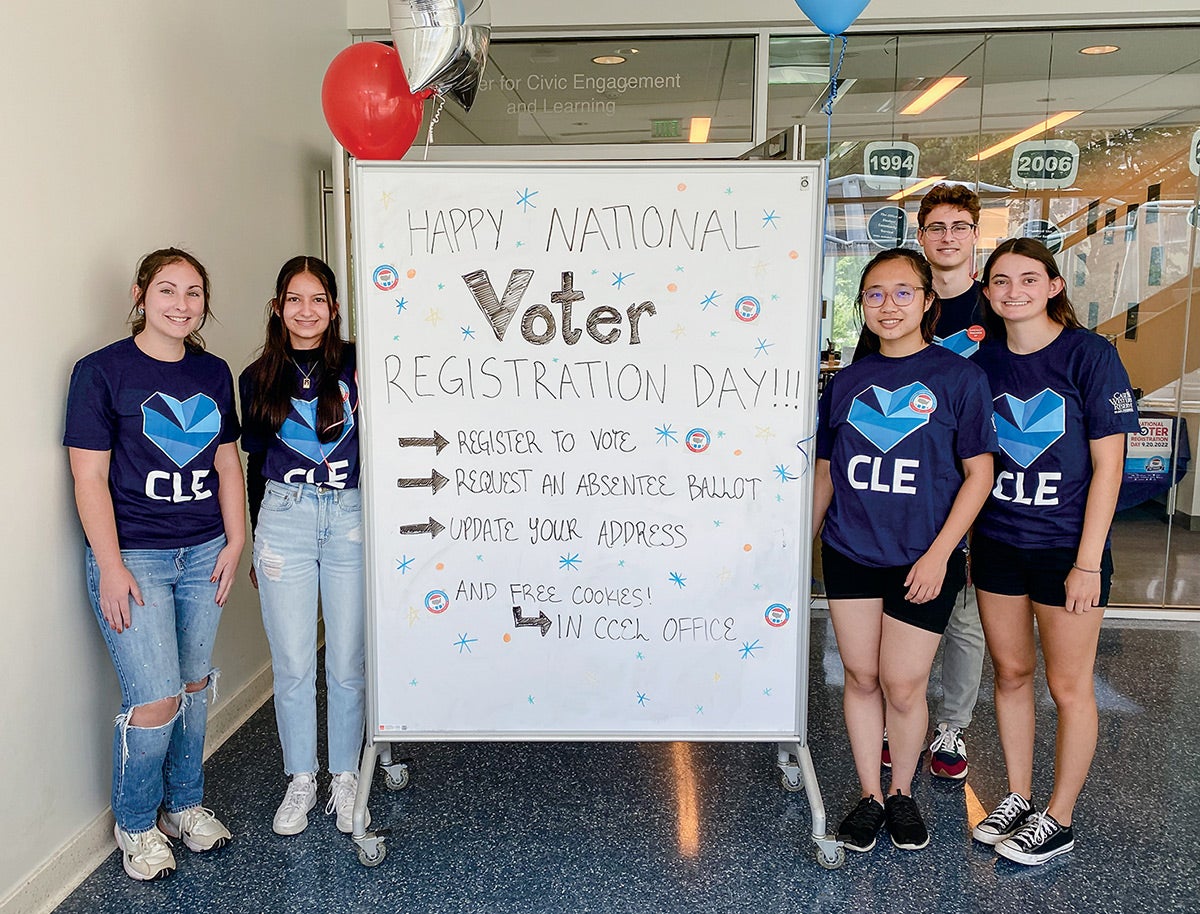 Group photo of Case Western Reserve students who helped peers access registration and absentee ballot forms.