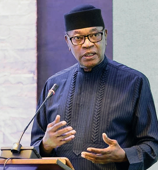 Photo of Mohamed Ibn Chambas talking at a microphone