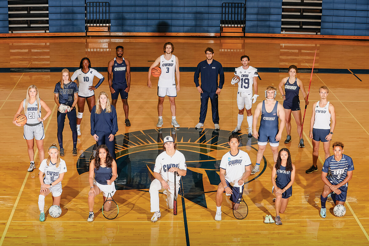 An overhead photo of a group of Case Western Reserve student athletes wearing new uniforms for each of their sports.