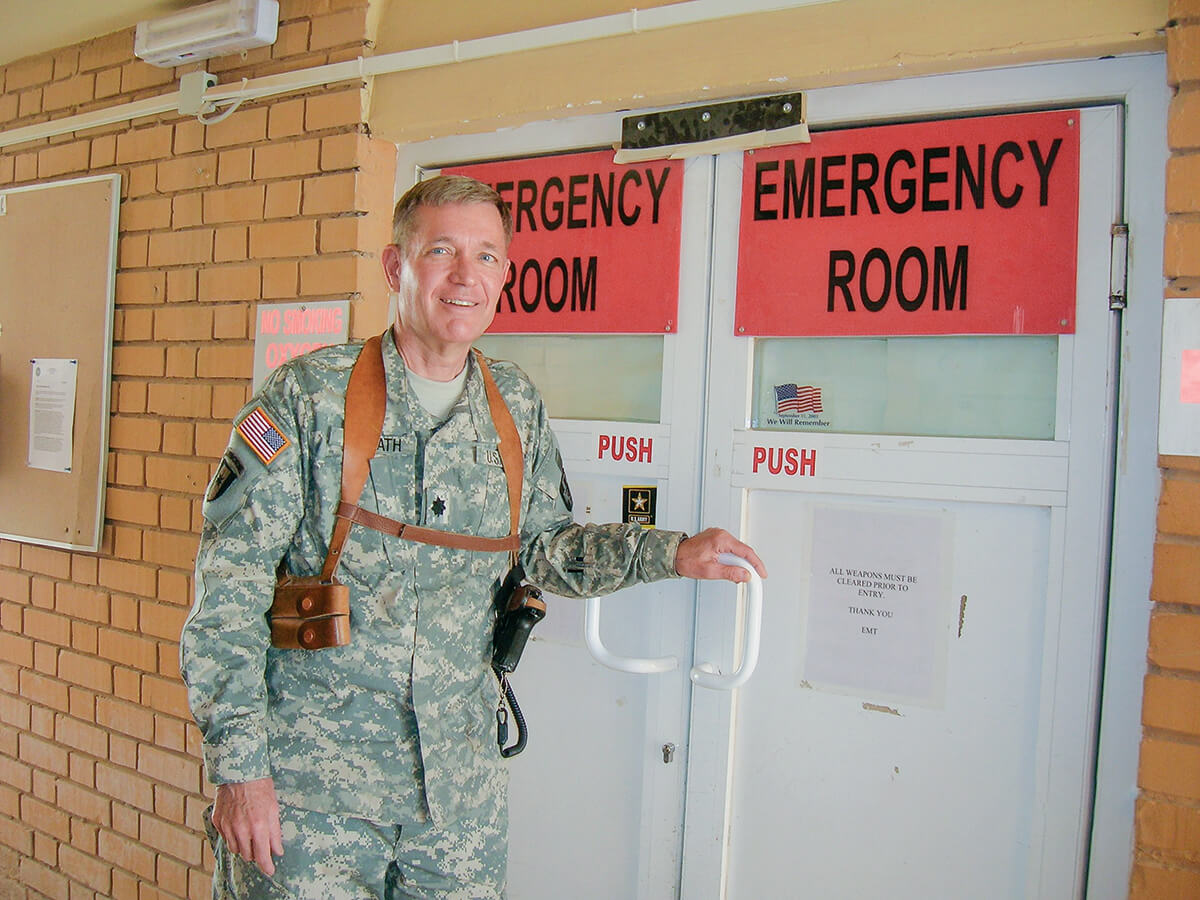 Case Western Reserve alumnus Edward Horvath, MD, entering a hospital emergency room for one of his shifts during a deployment in Iraq in 2008.