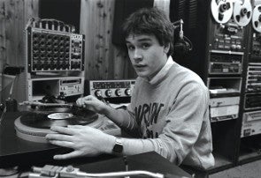 B&W--a student playing a record