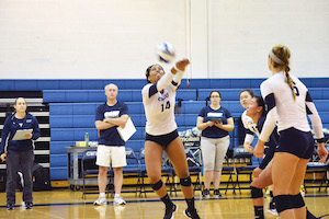 Photo of Case Western Reserve volleyball player Brianna Lemon bumping the volleyball