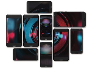 Many smartphone screens with images coming together to form a camera lens