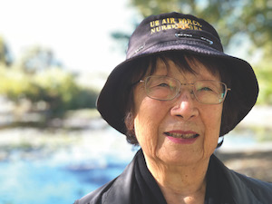 Headshot of Kiyo Sato wearing a U.S. Air Force Nursing hat