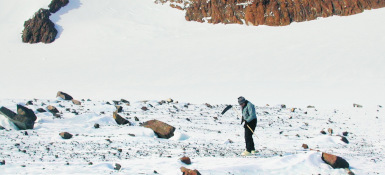 Case Western Reserve alumna Cari Corrigan outside in Antarctica searching for meteorites
