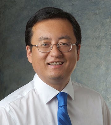 Headshot of Chris Yuan