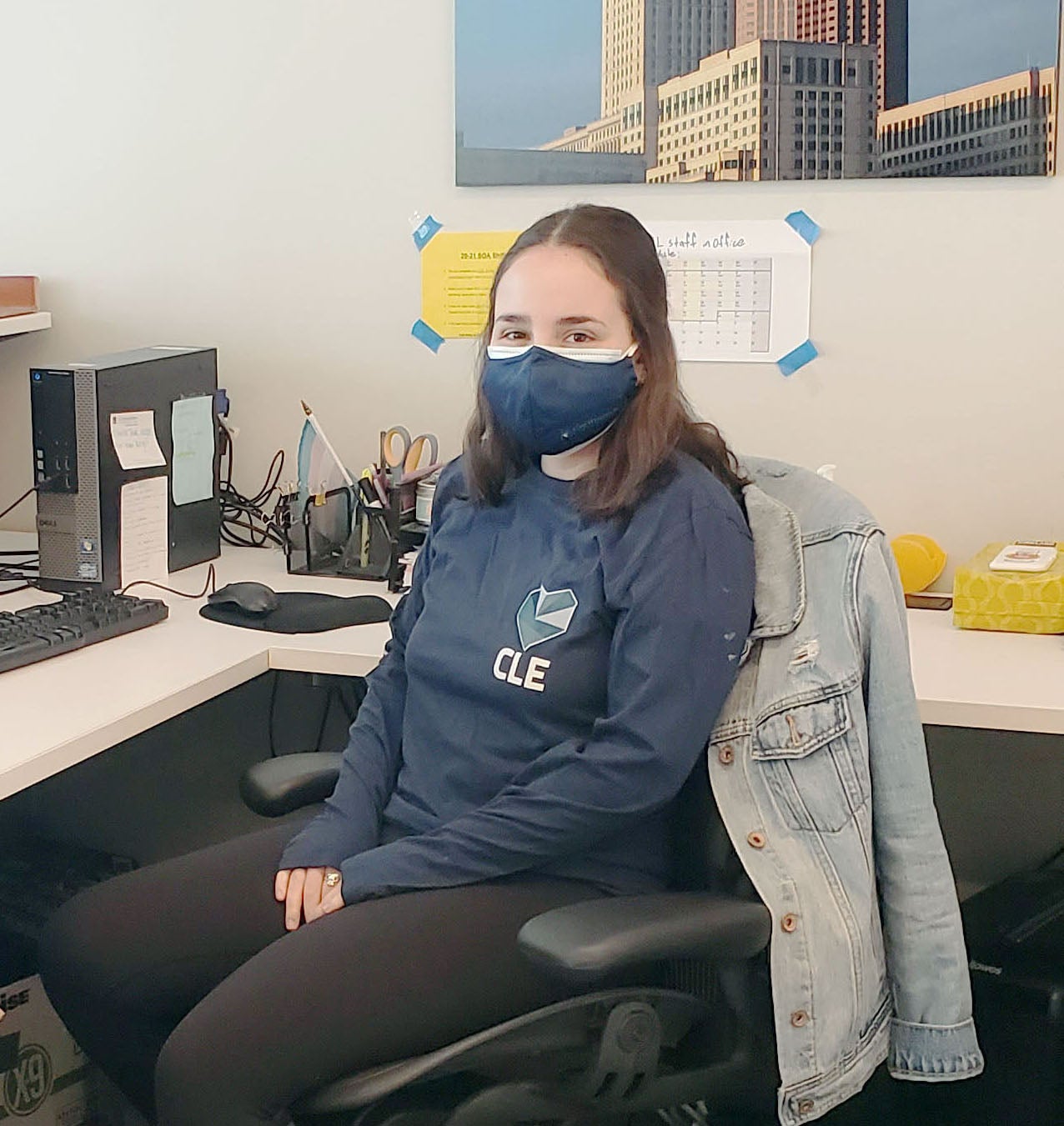 Image of Hannah Macias sitting at her desk