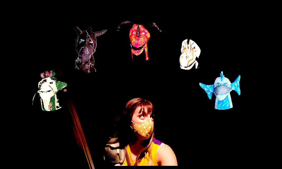 Image of woman wearing a mask surrounding by puppets.
