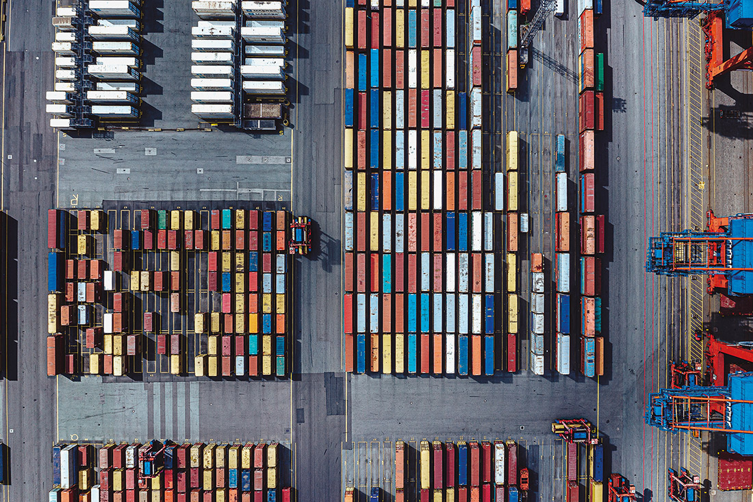 An overhead view of rows of shipping containers
