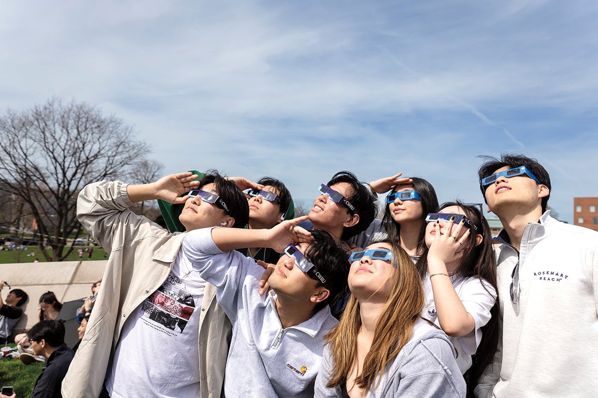 A group of student watching the total solar eclipse