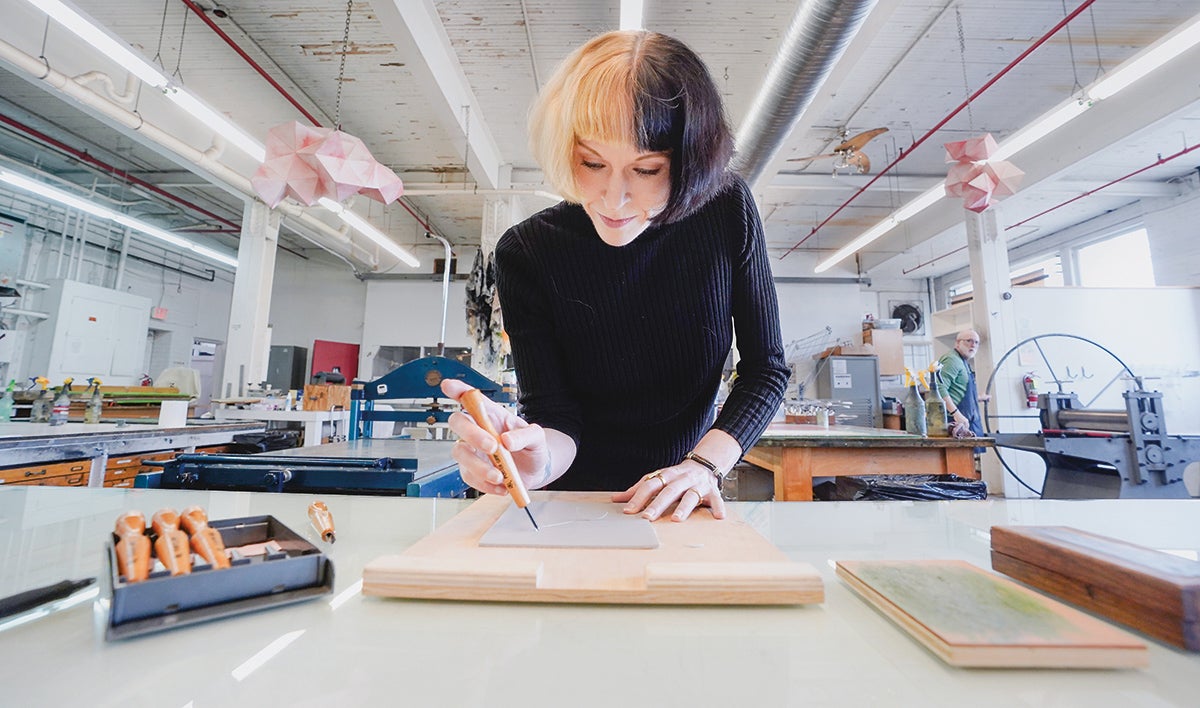 Megan Alves using printmaking technique at Zygote Press