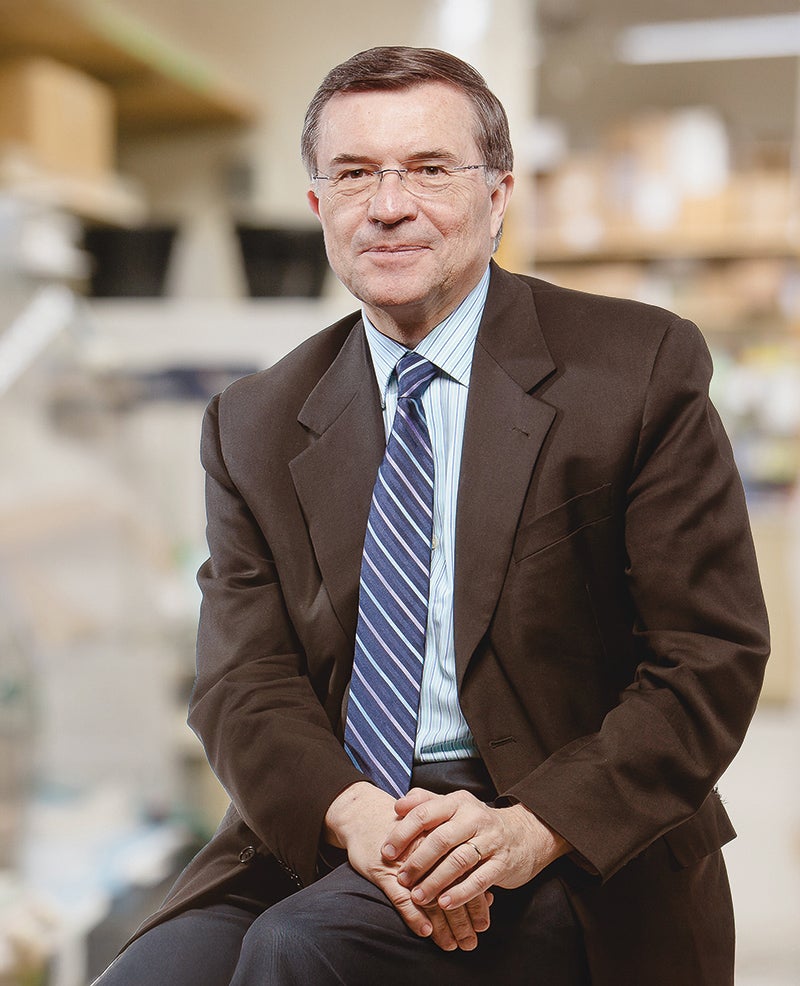Image of Terrence Sejnowski sitting and smiling
