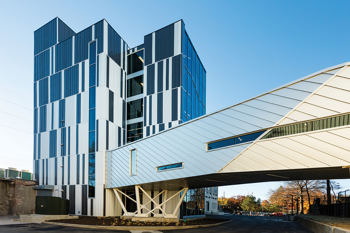 Image of building with glass windows and striped design on exterior