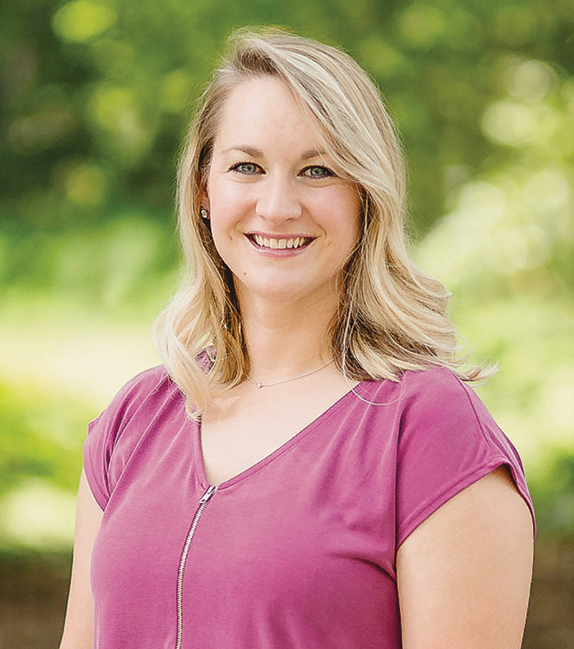 Photo of Jessica Wojtalik standing, smiling