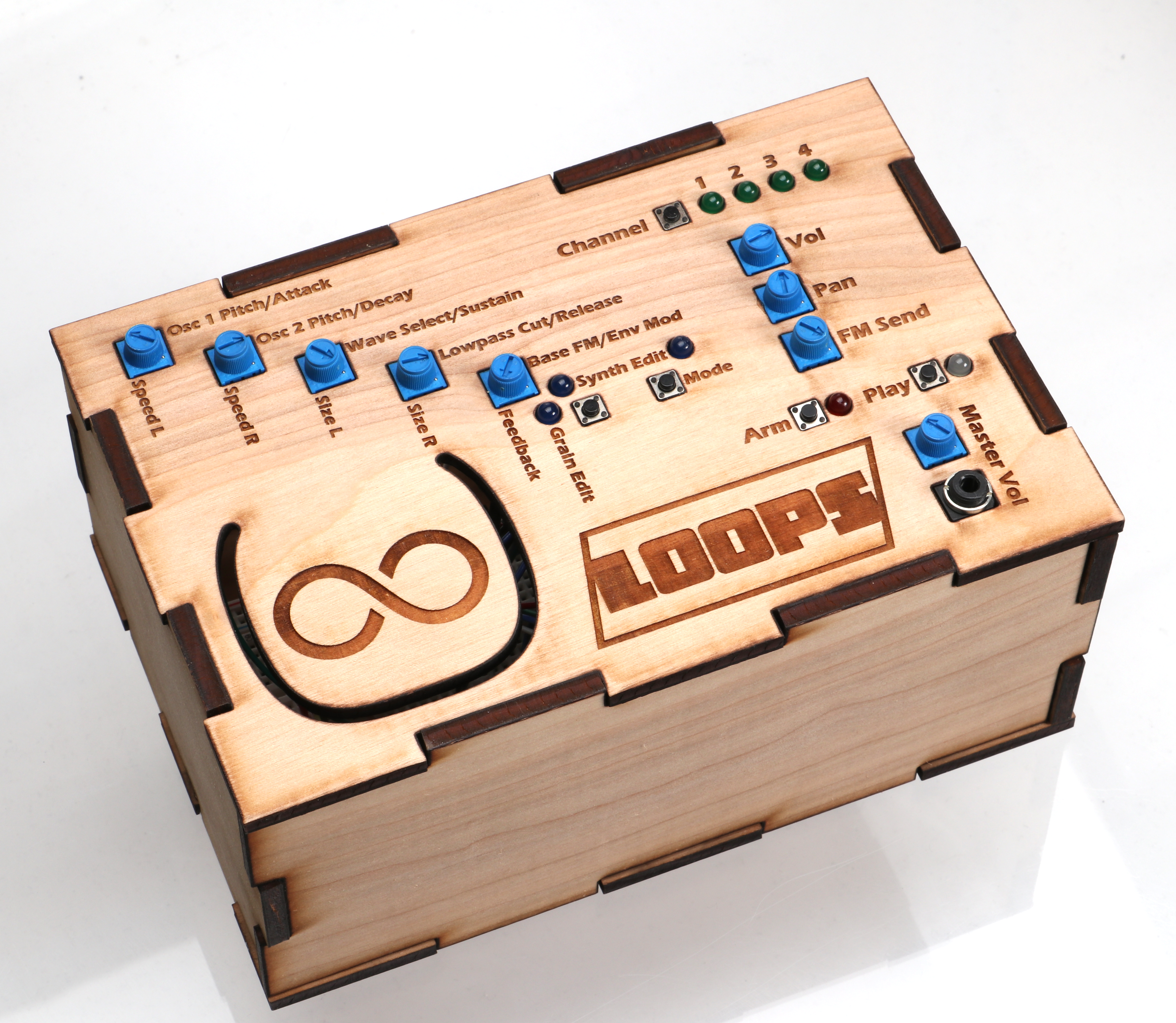A laser cut wooden box with electronics controls embedded in the lide.