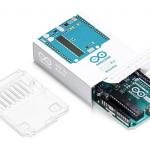 An unboxed Arduino Uno with plastic shield.