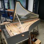 A harpsichord sitting on Floor 5 of think[box].