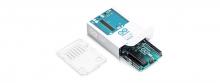 An unboxed Arduino Uno with plastic shield.