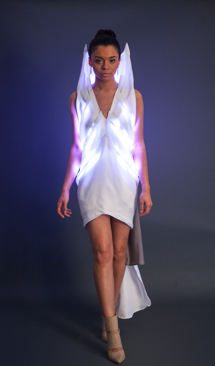 Image of a woman wearing a glowing dress 