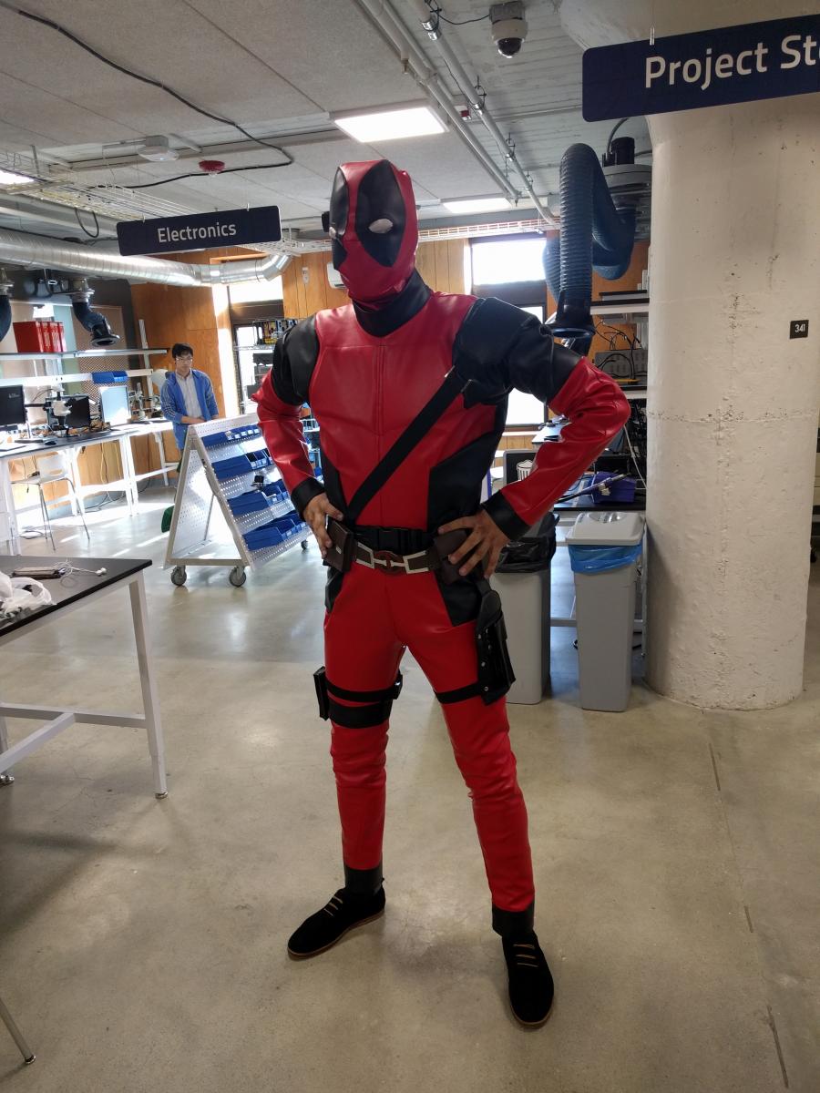 A person modeling the Deadpool costume
