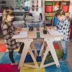 Children working at stand-up desks 