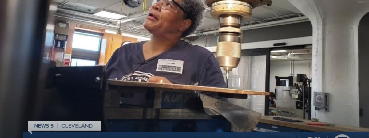 Kristy Fann watches a digital readout on a milling machine in Sears think[box]