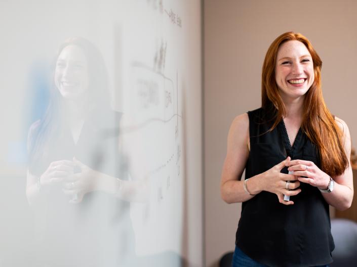 Person by Whiteboard
