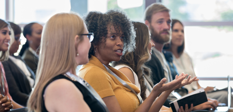 Conference attendees in discussion