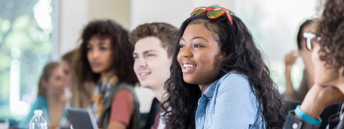 Group of students listening attentively
