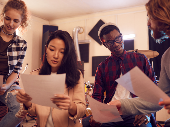 Students looking at papers